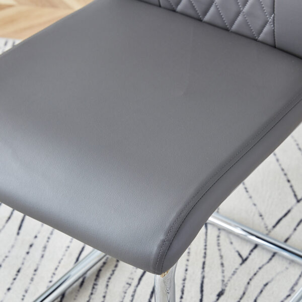0139b804c21b48eeac4bba9752167f49_b074d3f8bab9ef04bded2a0916204ac9 Table and chair set.71 * 35.4 inch rectangular dining table.Tempered Glass Tabletop,Silver 7-shaped Metal Table Legs.Paried With 8 Dark Gray High-quality PU Chairs With Arched Metal Legs.