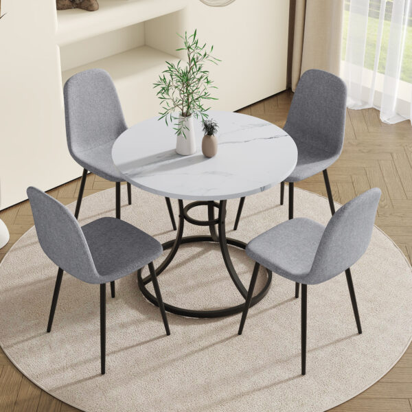 016e0fff0bf449e0b4a5a719c3552c62_37d308a9a961776d2e956416f9c315db Table and chair set.A Modern Minimalist Circular Dining Table With A Diameter Of 33.3 Inches.Paired With 4 Light Gray Linen-Cotton Material High Resilience Dining Chair with Metal Leg.
