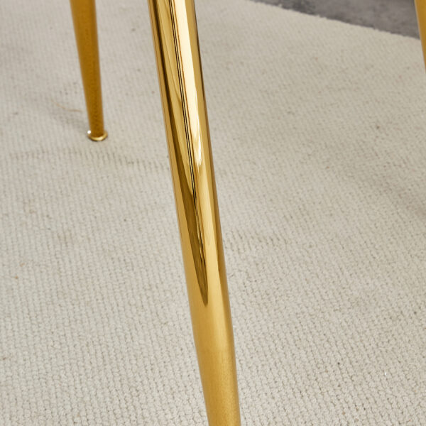 A glass tabletop with a diameter of 40 inches and a modern minimalist circular dining table with gold plated metal legs. 40 '* 40' * 30 ' DT-1164