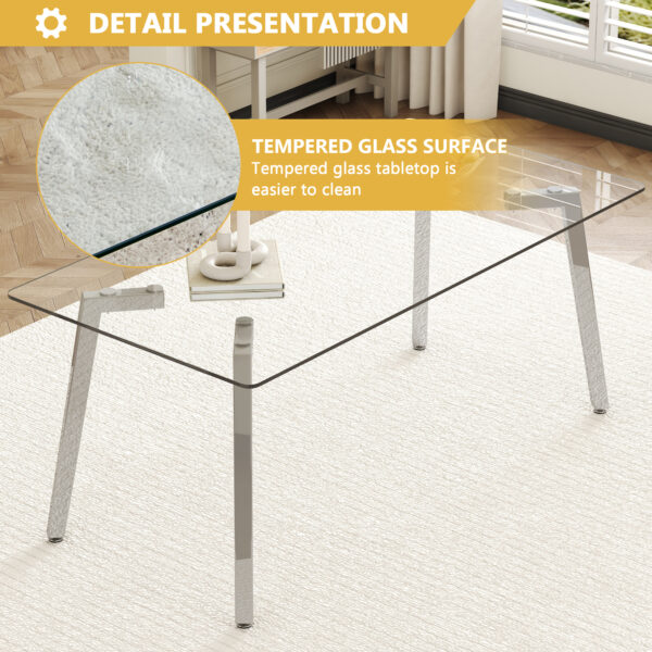 044333cb48e64dc18d73ab1baddaa4a9_b01eed8e5aee5164047a4547afcb5f63 71 * 35.4 inch rectangular dining table. The transparent tempered glass tabletop is paired with silver 7-shaped metal table legs, showcasing a minimalist texture. Suitable for various places.