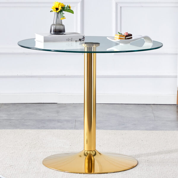 0666d7b343ff424cb01b5f1084a2df9f_565c1a93406c2496ed579c76b28d2750 A 35-inch diameter glass top and a modern, minimalist round dining table with gold metal legs. Ideal for dining rooms, living rooms and meeting rooms.