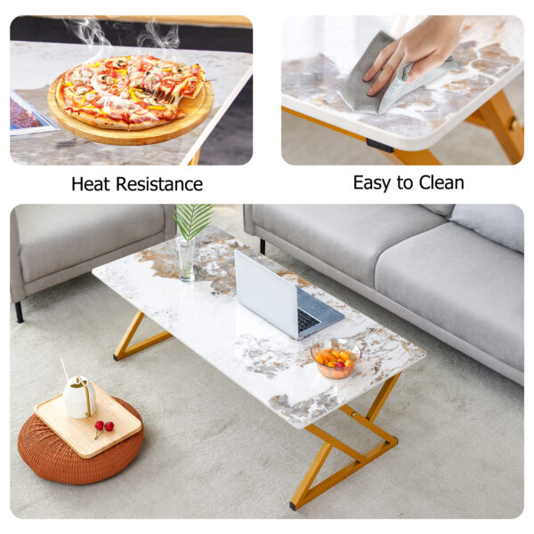 0a61b6e61641480eb7c614a495d5716f_b15bfb262332128a0c99c5541e00c0ce A coffee table is made of rock slab material, with a natural and smooth marble pattern on the surface, which complements the modern design of the golden metal legs and adds a touch of fashion.47*23.6