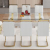 Table and chair set.Elegant Transparent Tempered Glass Dining Set - 71"x35.4" with 8 Light Gray PU Chairs with golden C-tube metal leg.X-shaped Golden Metal Table Legs,Black Textured MDF Crossbeam.