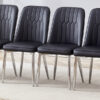 6 modern dining chairs, sleek PU backrest, and silver metal legs bring a comfortable home experience to the kitchen, bedroom, and office.Black PU Chairs with Simple Line Designs On The Backrest.