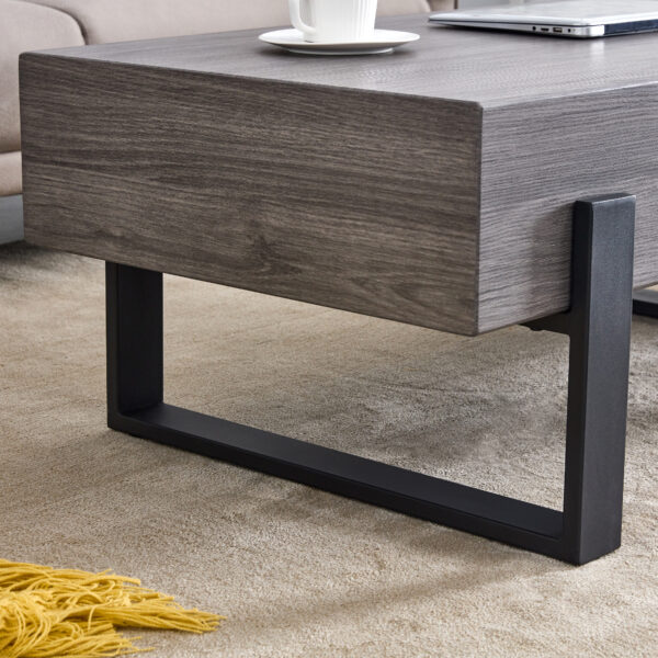 0d26717c10a34c36a11716e603b23bf1_20240122_fe9528fff68ee5da719e84bfc133a1c3 A rustic gray wood grain MDF coffee table with black metal legs - an elegant space in natural wood tones