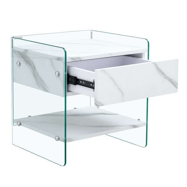 0d5a06d0d5934dd19ff4f3108b1b67cc_31378a8a67674cd9aa8e2a8b96036d21 Bedside table with drawers. The board surface is MDF sticker, and both sides are transparent tempered glass. The design is simple and elegant, with excellent storage functions.