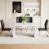 Table and chair set.63"*35.4" White Imitation Marble Pattern MDF Dining Table Set - 4 Soft and Comfortable Black PU Chair With Arched Metal Silver Leg.Create Your Exclusive Low-Key Luxury Space.