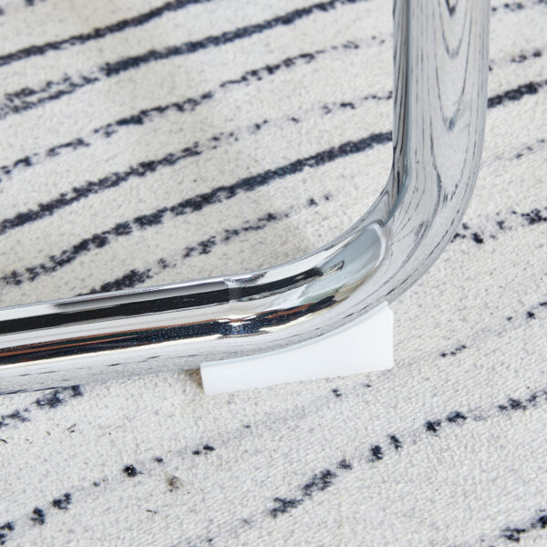 10c6a30ea1524657bd92c0f72ae682f2_1834e0c42d362266c9452522620c4848 Table and chair set.63"x31.5x30" Luxurious Snow Mountain Patterned Sintered Stone Table with Silver Metal Butterfly Legs.Paried With 4 Dark Gray High-quality PU Chairs With Arched Metal Legs.