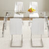 Table and chair set.71 * 35.4 inch rectangular dining table.Tempered Glass Tabletop,Silver 7-shaped Metal Table Legs.Paried With 6 White High-quality PU Chairs With Arched Metal Legs.