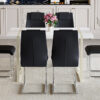 Table and chair set.55"x31.4" Cream-Style White MDF Dining Table Set with 6 Black Chairs With Silver Metal Legs.MDF Tabletop and metal frame legs.Adding a warm and gentle atmosphere to your family.