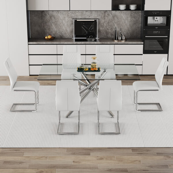 1238570da17c49d58eb0e8612038569e_65f6b070c632d25a7e5bf43195612c4c Table and chair set.Modern Luxurious Transparent Tempered Glass Dining Table Set with 6 Chairs.Single fork silver metal table legs.White high-quality PU dining chairs with silver metal legs.