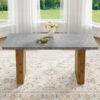 Large modern rectangular table with cement-grey patterned top and large MDF legs for kitchen, dining and living room to give a different atmosphere to the home environment.