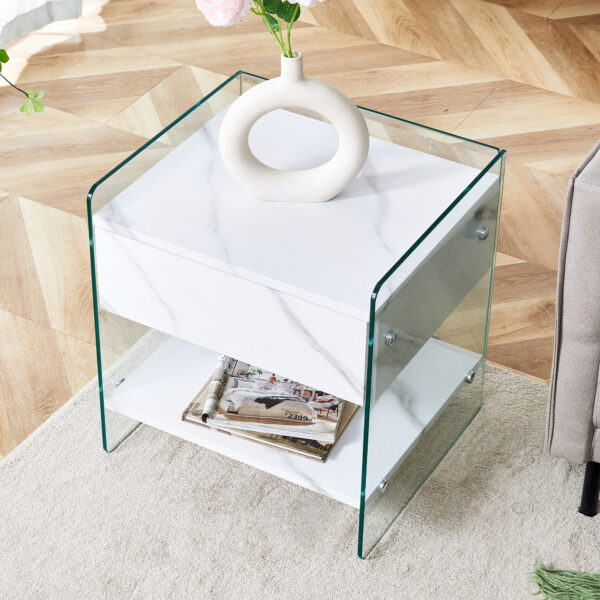 17471e97a8a7466b9ba74ab607305e73_f4fe6e6c16fe221972c182c525cac6d7 Bedside table with drawers. The board surface is MDF sticker, and both sides are transparent tempered glass. The design is simple and elegant, with excellent storage functions.