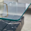 43.3 Inch Modern Two-Tier Coffee Table - Clear Tempered Glass and Black Marble Texture, Multifunctional Storage Design.The bottom tier includes a drawer.Can be used as a coffee table,side table,etc.