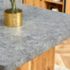 Large modern rectangular table with cement-grey patterned top and large MDF legs for kitchen, dining and living room to give a different atmosphere to the home environment.