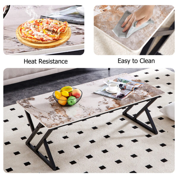 18be7aa6b95a4beb95852c5c00dff4dd_9ea5bb41edee538a52aa0f5f660190f9 A coffee table is made of rock slab material, with a natural and smooth marble pattern on the surface, which complements the modern design of the black metal legs and adds a touch of fashion.47*23.6