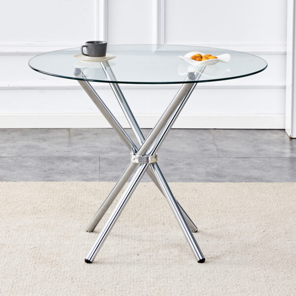 1cd078ac3888436dadadc9adca6b0e83_b410cf96ca4d7ed79bda3d0c4fc1e28d Round clear glass dining table with a unique shape for 4-6 people, with ring-shaped gathered silver metal legs, suitable for desks, kitchens, terraces, dining rooms.