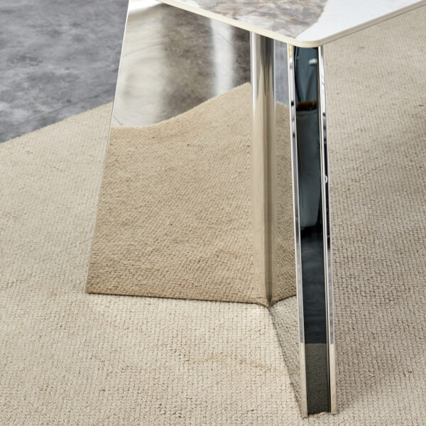 1f07667470a744c098f83e8d1f32bb47_4ceea3ee6d4ed0c21247b967f7005096 Table and chair set.63"x31.5x30" Luxurious Pandora patterned Sintered Stone Tabletop with Silver Stainless Steel Legs.Paried With 4 Black PU Chairs with a vertical stripe design on the backrest.
