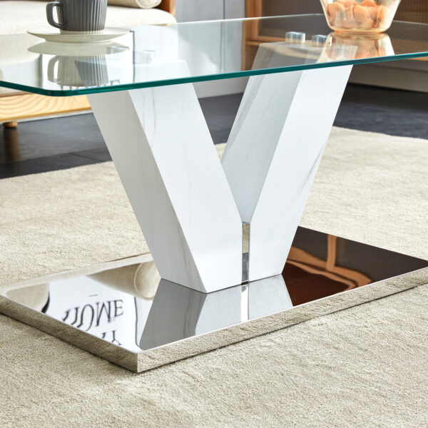 1f7e0f0e7e4f49759b54d938143a6cd2_20240206_b36d32dbe3e68461c5e156bc99cf1cd8 Modern minimalist coffee table. Transparent tempered glass tabletop with silver MDF pillars. Suitable for living room and dining room