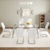 Table and chair set.71 * 35.4 inch rectangular dining table.Tempered Glass Tabletop,Silver 7-shaped Metal Table Legs.Paried With 6 White High-quality PU Chairs With Arched Metal Legs.