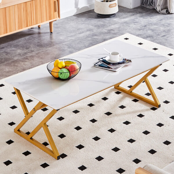 22dfda0bb65642099e1de3cc7c5a20b7_5731fe73b2f993b75d4dd3b452be834c A coffee table made of rock slab material, with a smooth and natural surface that complements the modern design of the golden metal legs, making it suitable for living rooms of all sizes.47*23.6