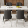 Table and chair set.63"x31.5x30" Luxurious Snow Mountain Patterned Sintered Stone Table with Silver Metal Butterfly Legs.Paired With 6 Black Chairs With Silver Metal Legs.Modern Light Luxury.
