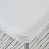 Table and chair set.63"*35.4" White Imitation Marble Pattern MDF Dining Table Set - 4 White PU Chairs with a vertical stripe design on the backrest.Create Your Exclusive Low-Key Luxury Space.