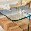 43.3 Inch Modern Two-Tier Coffee Table - Clear Tempered Glass and Natural Wood Grain, Multifunctional Storage Design.The bottom tier includes a drawer.Can be used as a coffee table,side table,etc.