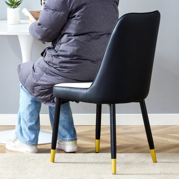 2976e57249f34a55be546ff7d2b4ba60_2d08ba991f6f757dd69f6bffdc0e4f43 Modern Two-Tone PU Dining Chairs - White and Black spliced chairs With Gold Decorated Legs.White and Black spliced,Black Metal Legs,Set of 4 chairs.