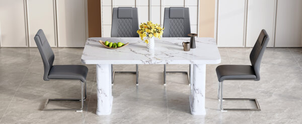 2bd9a3d442d549f8adc920acdada2cf9_a623614ece2cae95bd4b39fdefe97cef Table and chair set.64.5 x 35.4 Inch Stylish White Marble Textured Dining Table,Perfectly Blending Simplicity And Transparency.Paried With 4 Dark Gray High-quality PU Chairs With Arched Metal Legs.
