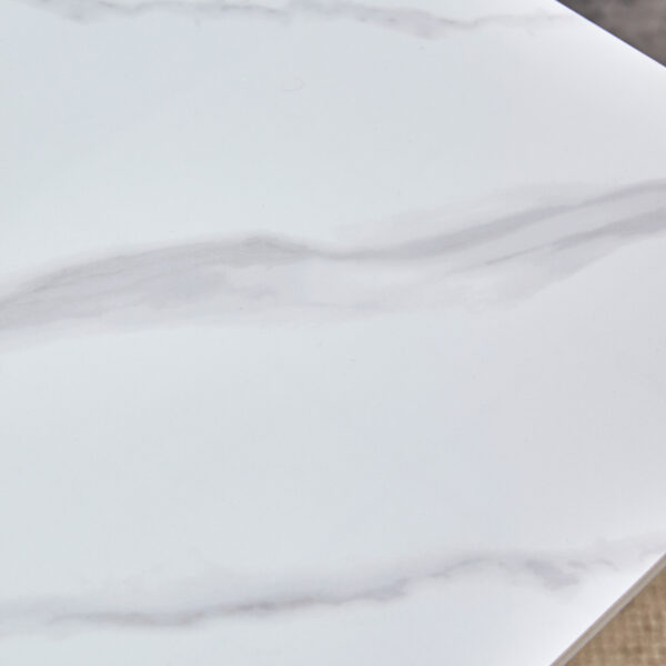 2c8362b56cf04695b4d565915ca39ddd_da52a1f5ff7010320947ba0fb7d47163 63"x31.5x30" Luxurious Snow Mountain Stone Sintered Stone Dining Table with Silver Stainless Steel Butterfly Legs.The tabletop is designed to be scratch and heat resistant.