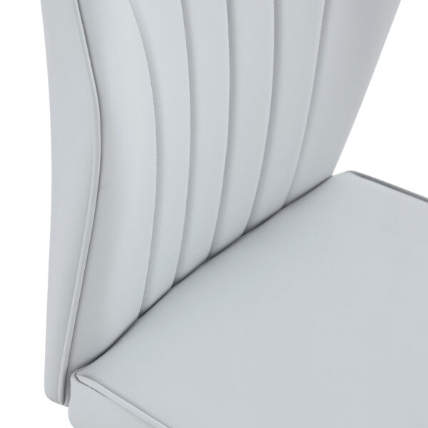 2cbd0ce41c5143e1a14e6f57334d6644_aaa288269079db099f9987c6b7fd92d1 4 light gray modern dining chairs with stylish PU patterned backrest and black metal legs for a comfortable home experience in the kitchen, bedroom and office.