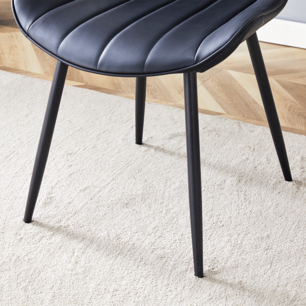 2d75f29a38ce472ca0073ed19acbc3fa_01b1dc9502132c36626b82661f9e83c5 Extended Seat Cushion PU Black Dining Chair Set - Four Pieces,Ergonomic Design.Smooth line design,Integral metal leg structure,Can integrate well into various modern home decoration styles.