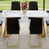 Table and chair set.63"x31.5x30" Luxurious Pandora patterned Sintered Stone Tabletop with Golden Stainless Steel Butterfly Legs.Paried With 6 Black High-quality PU Chairs With Arched Metal Legs.