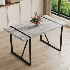 A minimalist retro rectangular dining table with a specially textured top and black metal legs.Contemporary Minimalist MDF Gray Textured Tabletop.Able To Give People A Visual Beauty With Rules.