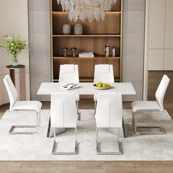317f1a7f5d62433689ab8653b24d8e8b_c1e9c205b2fa395a193612e1c4d65361 Table and chair set.63"x31.5x30" Luxurious Snow Mountain Patterned Sintered Stone Table with Silver Stainless Steel Butterfly Legs.Paried With 6 White High-quality PU Chairs With Arched Metal Legs.