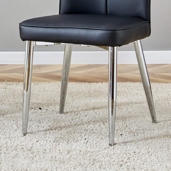 3466d9bde6fd488785383ceb7ff97d99_97df37c6148fa00fa825b6a7a14f67ef Table and chair set.63"x31.5x30" Black Marble-Patterned Slabs Tabletop with Stainless Steel Butterfly Legs.Paired with 4 Black PU dining chairs with a vertical stripe design on the backrest.