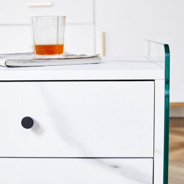 Double-drawer bedside table. The board surface is MDF sticker, and both sides are transparent tempered glass. The design is simple and elegant, with excellent storage functions.