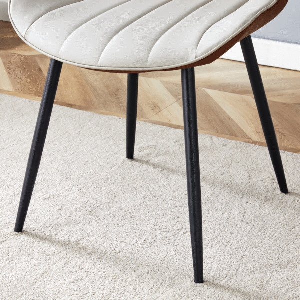 38accd5ad38d4780878b22e05af156a1_c41c27a15e1e456419a4ae0e77c89ae8 Extended Seat Cushion PU Dining Chair Set - Four Pieces.Smooth line design,Integral metal leg structure,Can integrate well into various modern home decoration styles.Gray and Brown Splicing Colors.