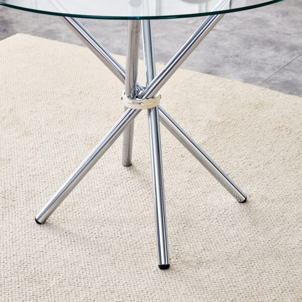 39174099c27c4395a0cc56a9c2e13490_07fcf331b5cd80f3df539ca1055001aa Table and chair set.36.6"Round clear glass dining table with a unique shape with ring-shaped gathered silver metal legs.Paired with 4 Dark gray high-quality PU dining chairs with silver metal legs.