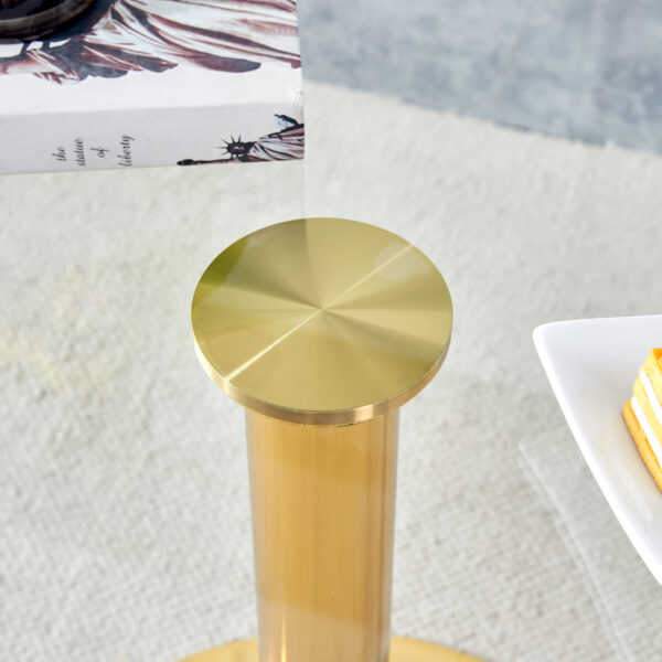 3a43cc0930af4bcbba0d3151443da7bd_39186c1e4c6d67f7dfd476944e939290 A 35-inch diameter glass top and a modern, minimalist round dining table with gold metal legs. Ideal for dining rooms, living rooms and meeting rooms.