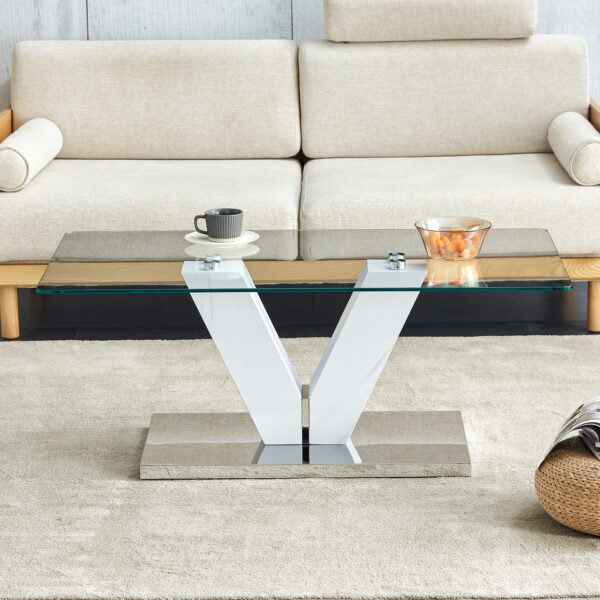 3b8bcbc1d08f4b599907397c7147564e_20240206_55e4399a0719e41f84e7c7877f44bf85 Modern minimalist coffee table. Transparent tempered glass tabletop with silver MDF pillars. Suitable for living room and dining room