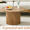 A modern circular coffee table with a diameter of 27.5 inches interprets home aesthetics and practicality. MDF material,cylindrical table leg design.Becoming the visual focal point of home decoration.