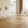 Modern minimalist dining chairs, white PU back and seat cushion, white metal legs, suitable for dining room,living room.Cream-Style dining chairs with a vertical line design on backrest.Six Pieces.