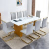 Table and chair set.Large modern rectangular table with 0.4 inch patterned glass tabletop and large MDF table legs.Comes with 8 chairs with faux leather cushioned seats and golden metal legs.
