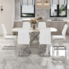 Table and chair set.Modern Luxurious white Marble-Patterned Tempered Glass Dining Table with 6 Chairs.Single fork silver metal table legs.White high-quality PU dining chairs with silver metal legs.