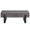 A rustic gray wood grain MDF coffee table with black metal legs - an elegant space in natural wood tones