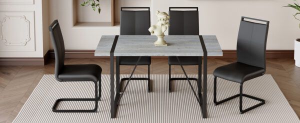4038c70d56b146018a93bfe11d17b6bb_8bc1b34bf9e5bf8d95eb0edc6a0f0350 Table and chair set. Modern minimalist grey marble textured MDF dining table with metal frame.Paired with 4 black PU chairs with Black Featuring arched black legs.