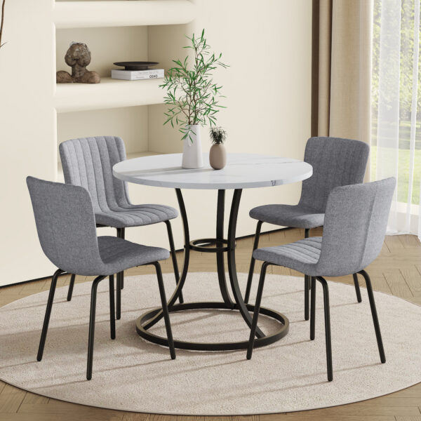 421973928e1d43b880913e936a54574a_e15c4e07026e37189b46d6afb81b4cbd Table and chair set.A Modern Minimalist Circular Dining Table With A Diameter Of 33.3 Inches.Paired With 4 High Quality Light Gray Dining Chairs Made Of Linen Fabric.Iron pipe spraying Legs.