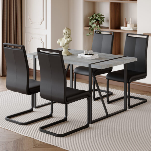 45dc8ea52f414f1ba930d032b3384e68_f752fca187afafa6e755ef5688456e13 Table and chair set. Modern minimalist grey marble textured MDF dining table with metal frame.Paired with 4 black PU chairs with Black Featuring arched black legs.